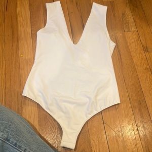 FP bodysuit size small